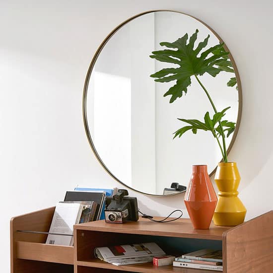 Miroir rond doré, le classique intemporel
