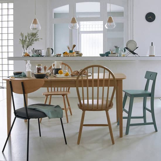 Avec quelle table de salle à manger associer une chaise design ?