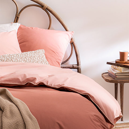 Linge de lit décliné dans un camaïeu de rose