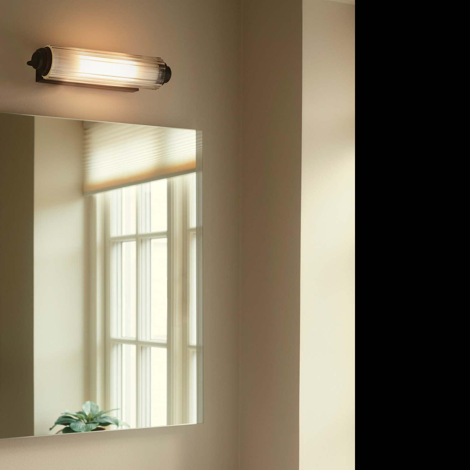 Applique Nimal en situation au-dessus d'un miroir de salle de bain