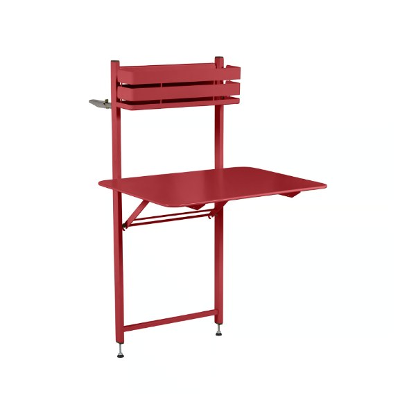 Table pliante Balcon Bistro rouge Piment Fermob fixée sur une balustrade, packshot fond blanc