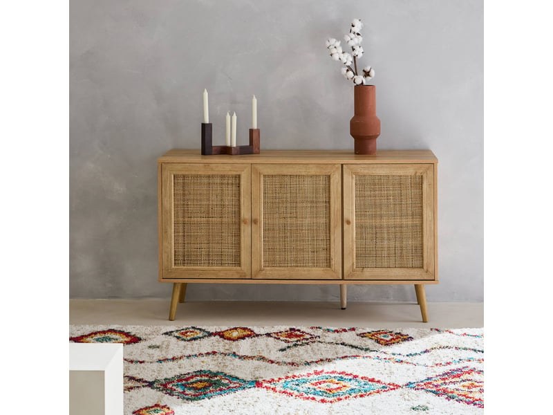 Buffet en cannage beige Sweeek Conforama en situation dans un salon