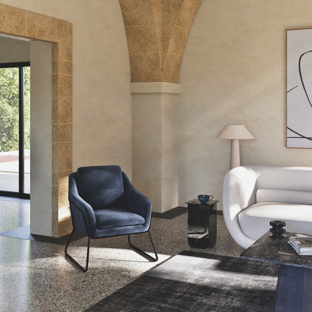Fauteuil Jasper en velours bleu de Prusse dans un salon lumineux