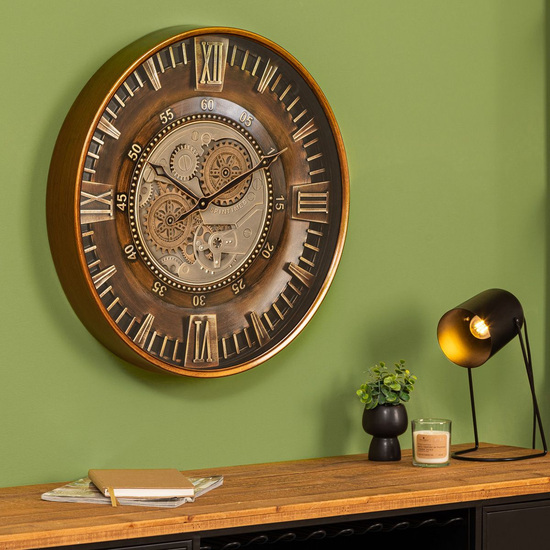 Horloge industrielle à engrenages mobiles et cadran patiné