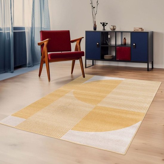 Tapis à motif géométrique arrondi Pilo Drawer dans un intérieur décoré