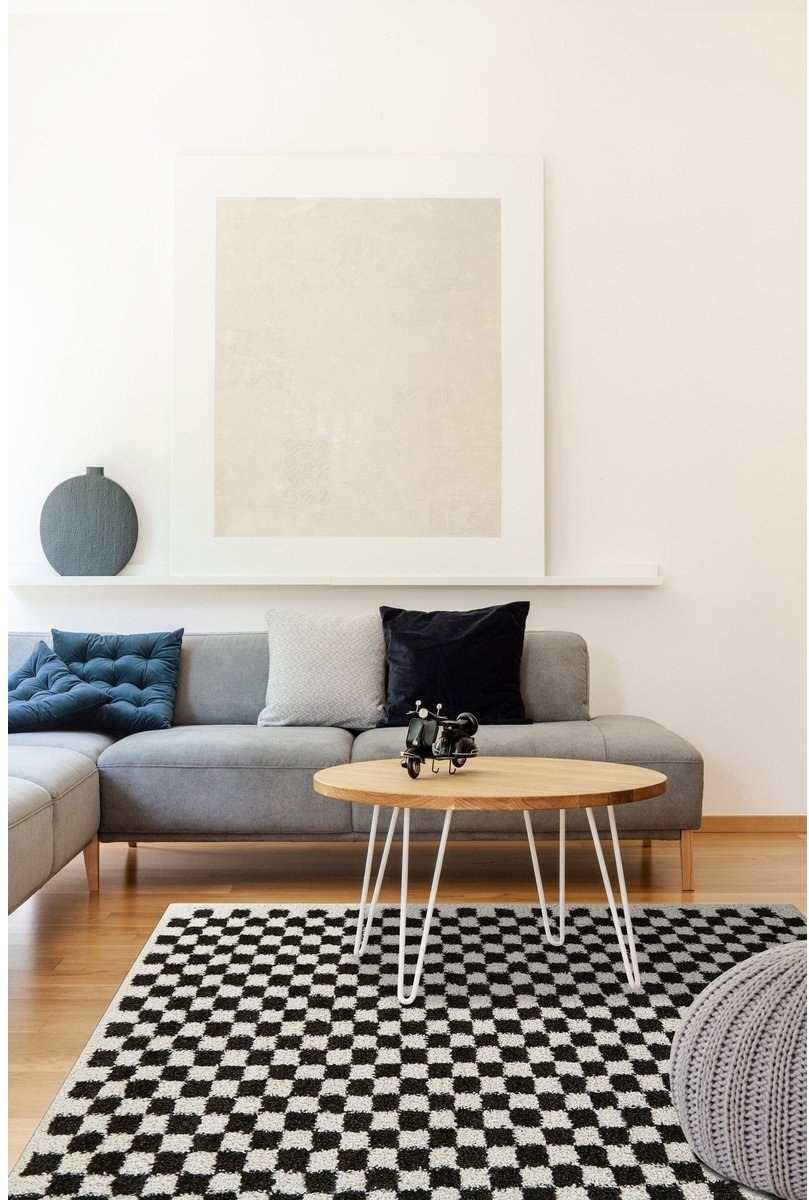 Checkers, le tapis damier noir et blanc graphique